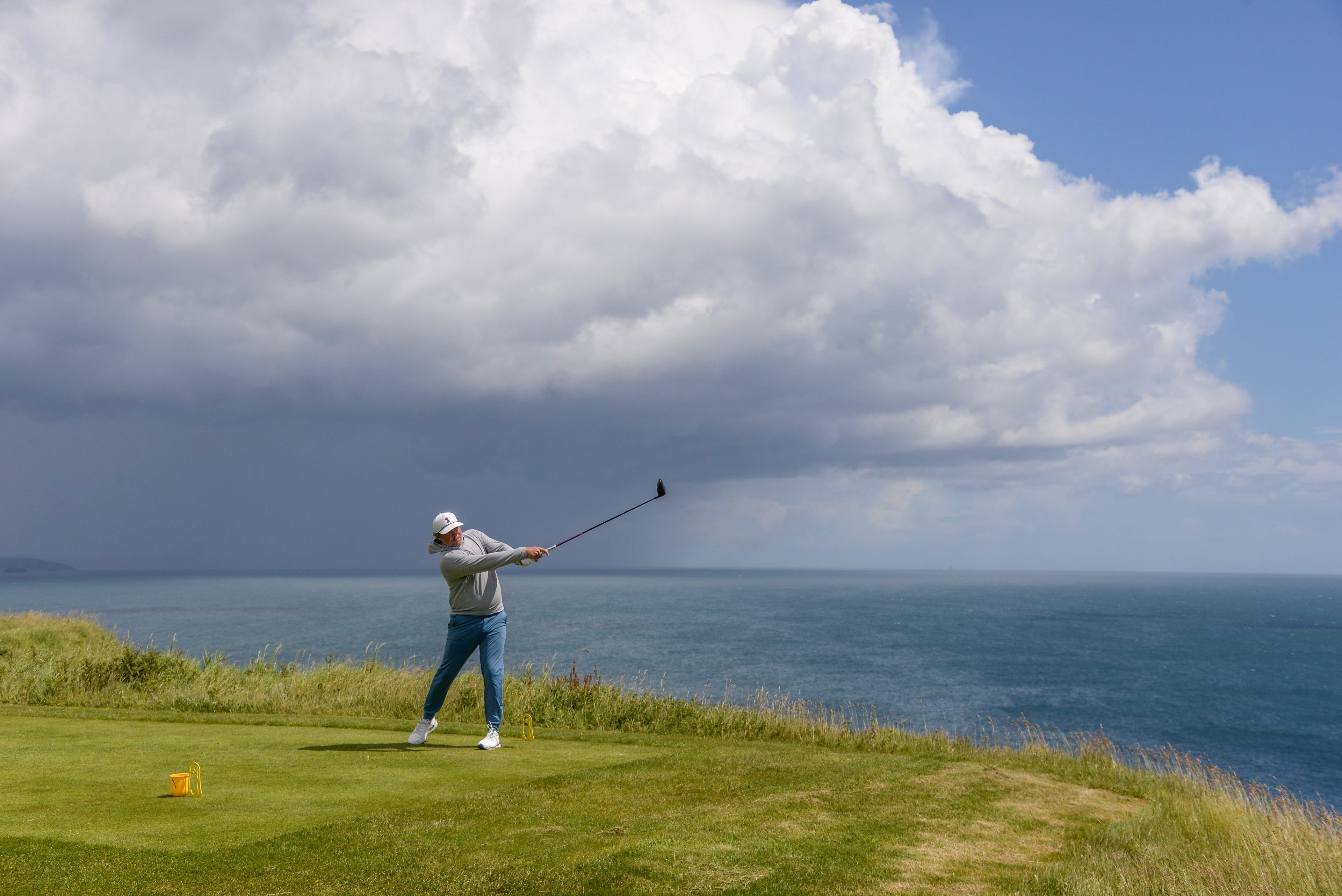 A golfer on an Ireland buddies golf vacation trip at Old Head Golf Links.