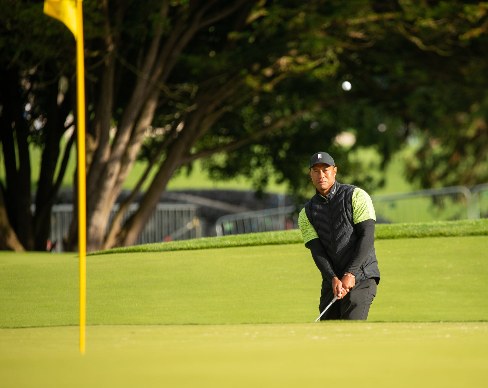 Tiger Woods chips to the 18th green at Adare Manor at the end of Day 1 of the 2022 JP McManus Pro-Am in Limerick.